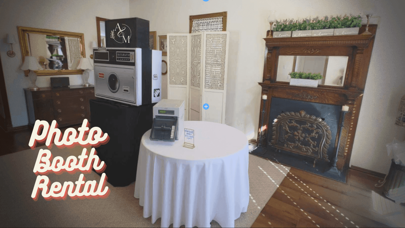 Vintage photo booth rental setup in a cozy room with antique furniture and ornate decorations.